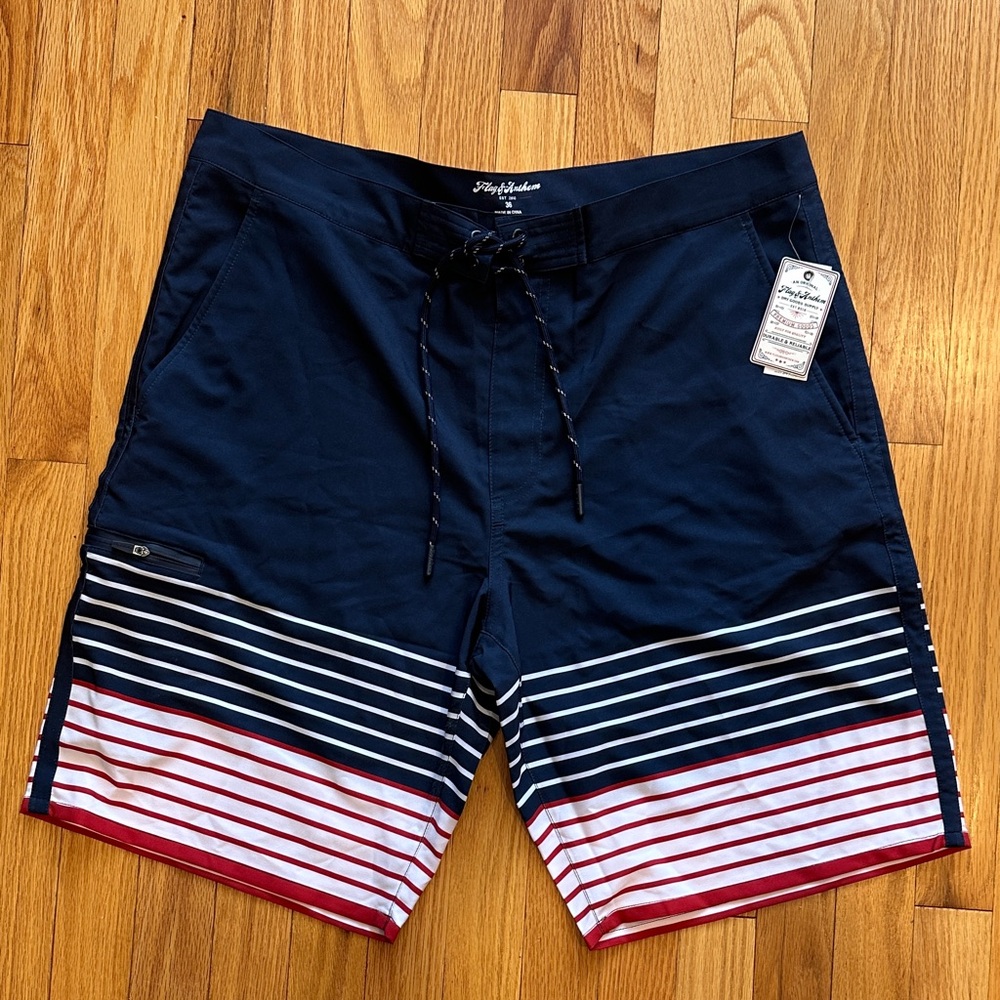 NEW WITH TAGS, MEN’S FLAG & ANTHEM BOARD SHORTS - SWIM SUIT, SIZE: 36